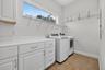 Laundry Room across from Primary Bedroom