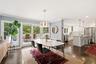 Dining area leading to back deck