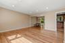 The spacious living room opens to the formal dining room.