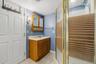 Lower level bathroom with shower and tub.