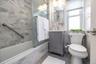 Updated full bathroom with glas shower doors