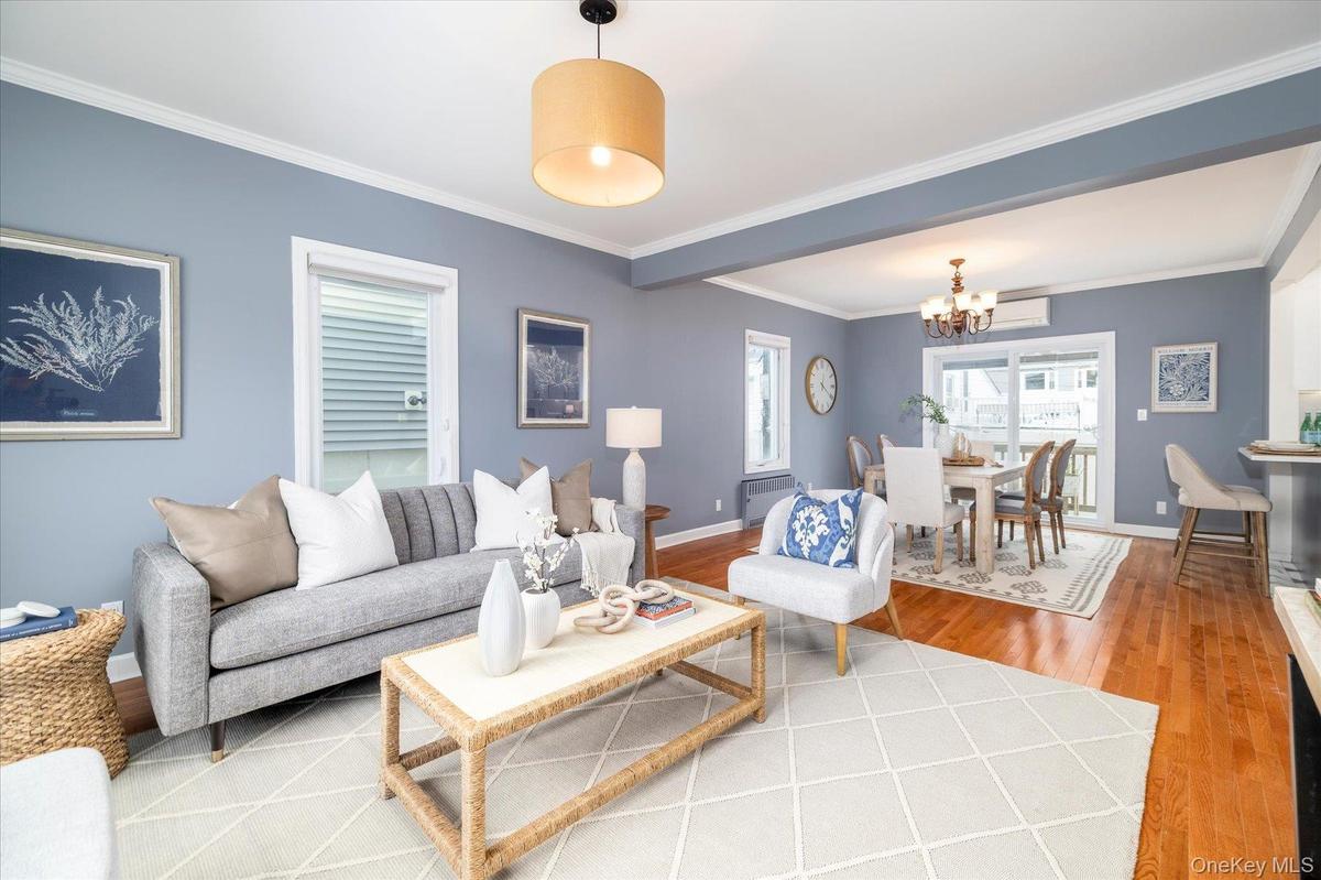 Open concept living area with hardwood floors throughout