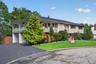 Front w/ mature landscaping