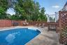 inground pool with 6 ft fence