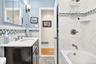 Updated Hallway bathroom with shared access from Primary bedroom