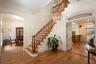 Foyer with dining room to the left, formal living room to the right.