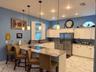 Backyard view from the kitchen sink, stainless steel appliances, granite counters, eat in kitchen