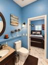 Dual access half bathroom