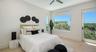 Guest bedroom with access to balcony