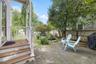 Side patio with pond