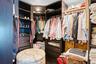 Built-in shelving, integrated drawers, and hanging rods