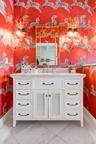 White vanity with ample drawer storage, louvered cabinet doors, and a light-toned countertop