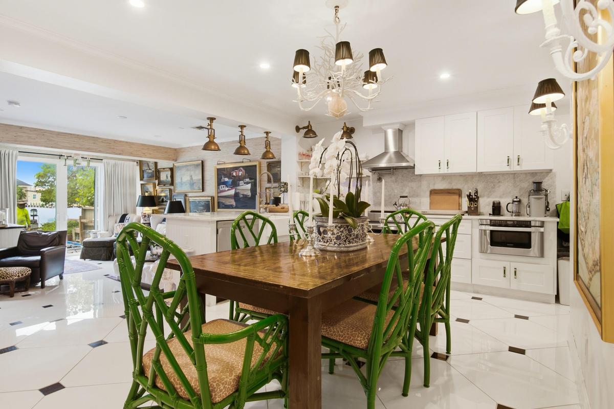 Gleaming tile flooring with dark accent squares