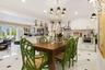 Gleaming tile flooring with dark accent squares