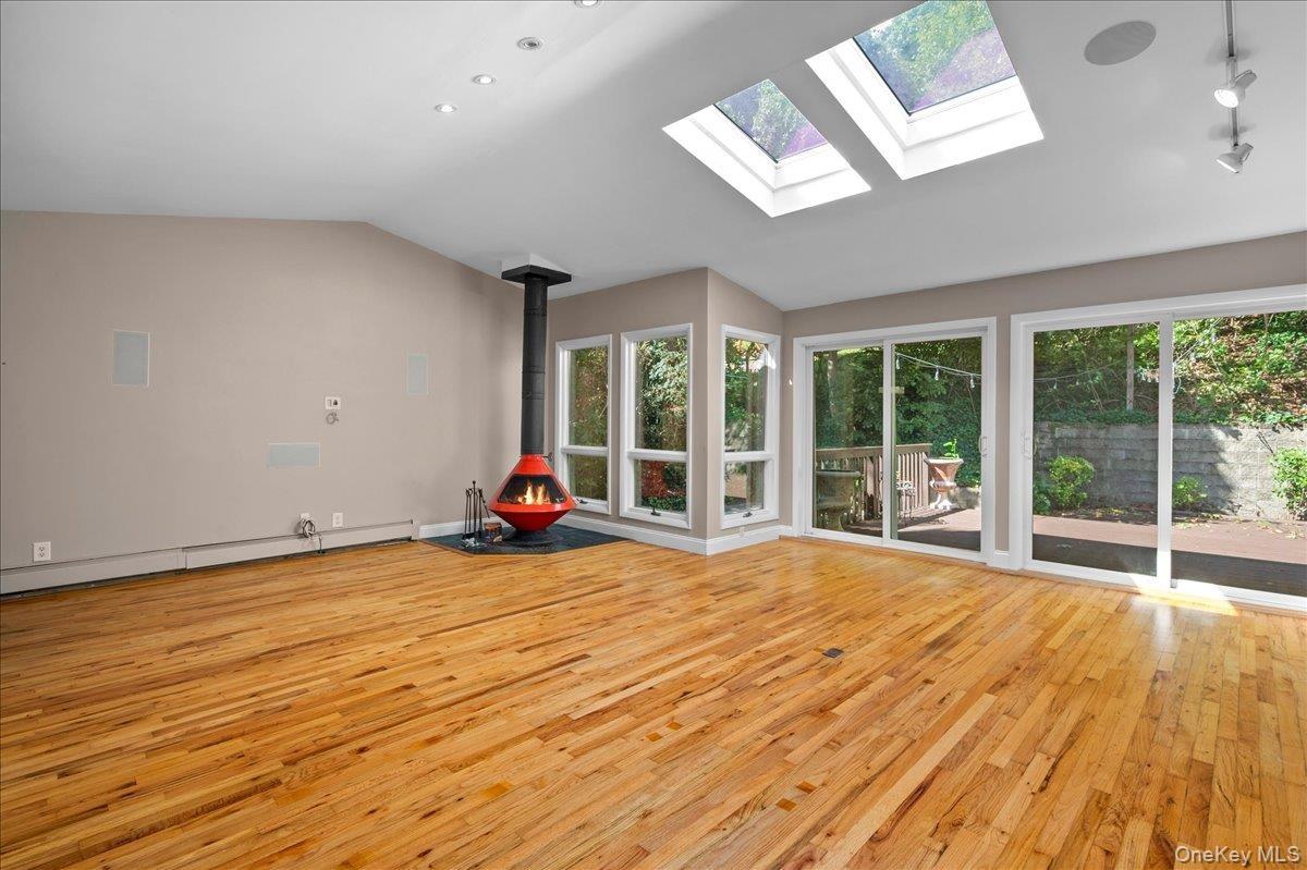 Vaulted Ceilings and Wood Burning stove in the Family Room