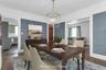 Furniture is virtually staged in the dining room