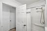 Upstairs full bathroom with tub