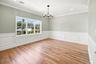 Hardwood flooring, crown molding, wainscoting, recessed lighting.
