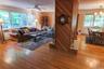Open Floor plan with dual fireplace in living room and dining room