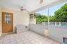 Back patio, leading to pool and backyard