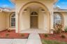 Charming arched entry welcomes you inside.