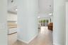 Easy flow from the hallway into the living spaces.