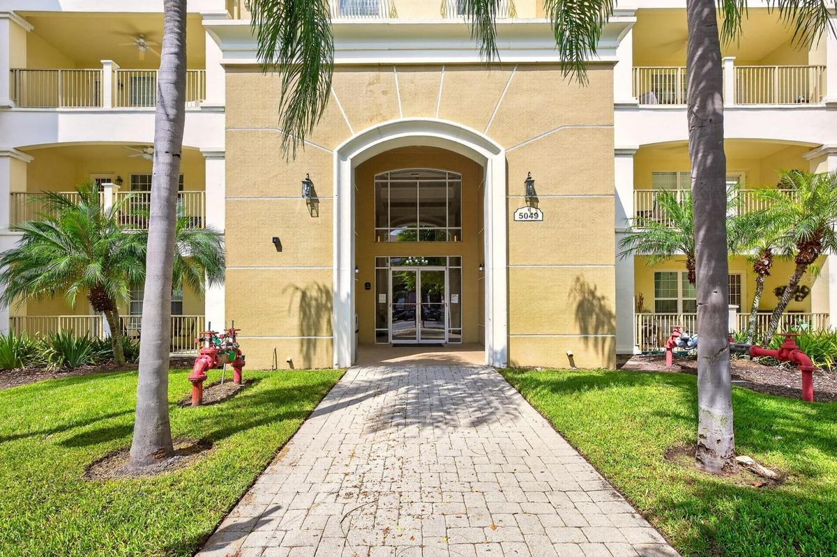 TURNKEY, FULLY FURNISHED and SHORT-TERM RENTAL APPROVED – this 3-bedroom, 2-bath condo in the GATED Bayshore at Vista Cay community offers incredible 