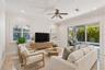 Virtually staged  living room illustrating one way to furnish the space.