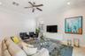 Another view of the living room, from the sliding doors toward the TV area.