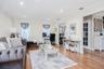 Hardwood-finish flooring, recessed lighting, crown molding, and decorative interior doors