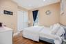 Bedroom 4 wood-finish flooring, recessed lighting, double bi-fold closet, and a single window