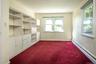 Bedroom w/built-in shelving