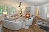 Spacious Living room with fireplace offers  lovely views of the Bronxville Lake through new divided light windows
