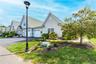 An Attached One Gar Garage & Paved Driveway