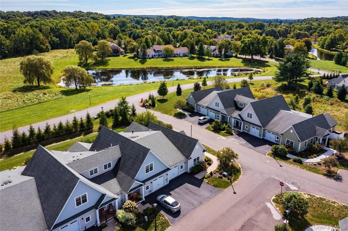 Condo has Eastern Views Open Field & Large Pond