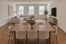 VIRTUALLY STAGED Great room from kitchen towards front window
