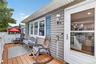 Welcoming Deck provides entry.