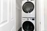 washer and dryer in primary bedroom