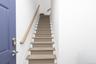 Main Staircase on Grace Hall Lane, adjacent to One-Car Garage