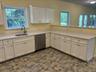 Open to living and dining.