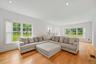 Family room, with Anderson windows, recessed lighting, wide plank white oak flooring and 9 foot ceilings.