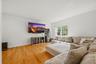Family room, Anderson windows, 9 foot ceilings, recessed lighting, and wide plank white oak flooring.