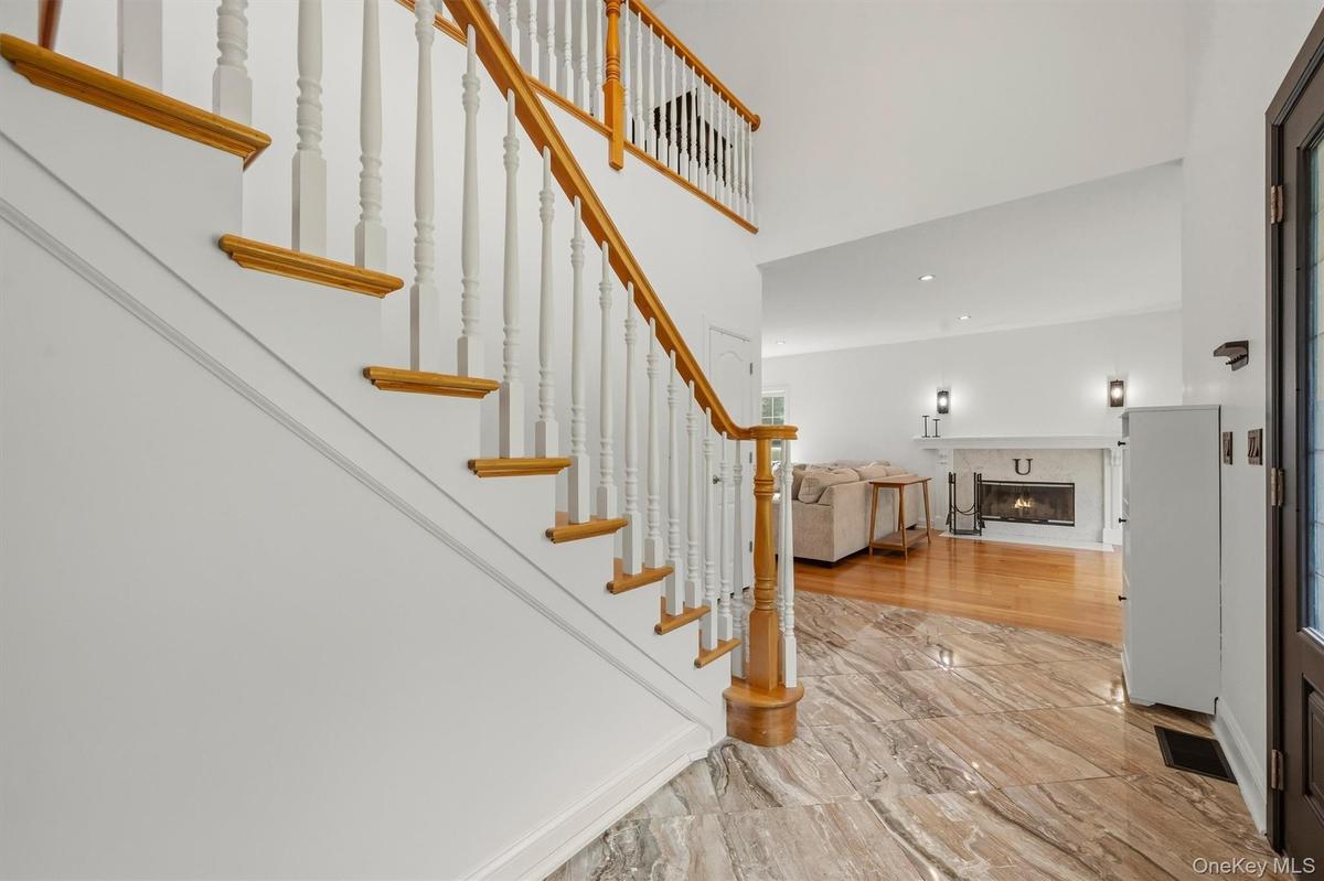Grand two story foyer with overlook.