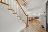 Grand two story foyer with overlook.