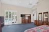 Overlook the pool from the primary bedroom
