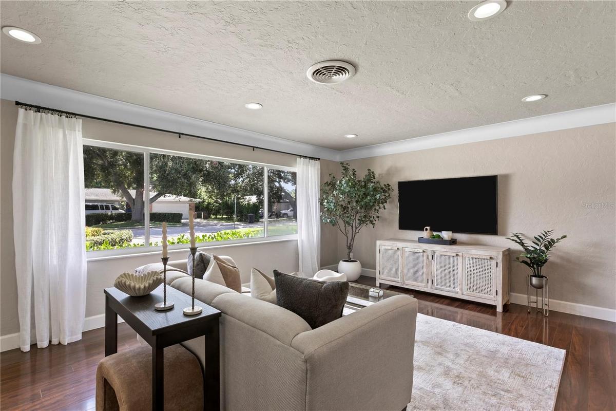 You will immediately appreciate the thoughtfully designed split floor plan...