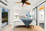 Wood-finish flooring, recessed lighting, and a ceiling fan