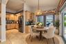 staged kitchen and eat in area