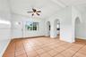 Living room at the front entry, vaulted ceiling
