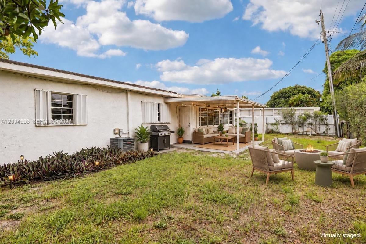 Virtually staged: backyard with covered patio